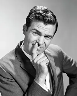 Smirking: Portrait Businessman Pointing at Nose