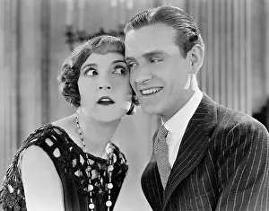 Startling: Portrait of a couple cheek to cheek