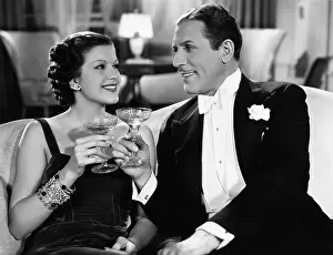 Interactions: Portrait of couple having drinks