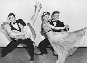 Liveliness: Portrait of two couples dancing