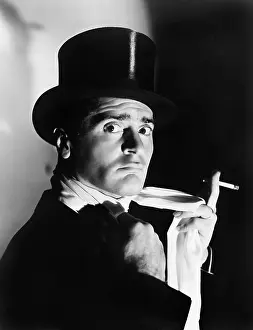 Formalwear: Portrait of an elegant man in a top hat