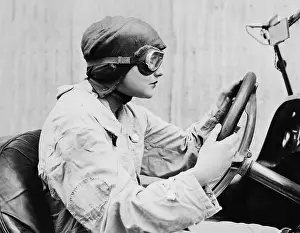 Racecars: Portrait of female racecar driver