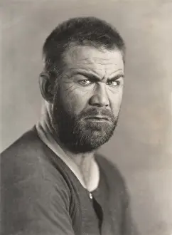 Irritated: Portrait of a frowning bearded man