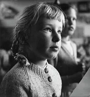 Upward: Portrait of a girl in a classroom