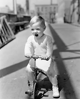 Trike: Portrait of kid riding tricycle