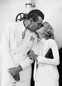 Tenderness: Portrait of kissing couple