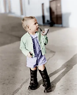Imitating: Portrait of little boy with pipe