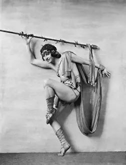 Sneaking: Portrait of male dancer in costume