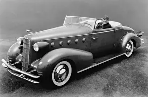 Affluence: Portrait of man in antique car