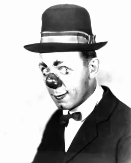 Greasepaint: Portrait of a man in clown makeup