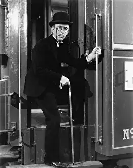 Supportive: Portrait of a man debarking a train