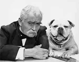 Mustaches: Portrait of man and dog