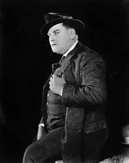 Close Ups: Portrait of a man in hat and suit