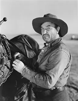 Durable: Portrait of man with horse