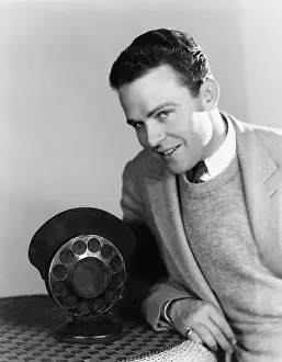 Flirtatious: Portrait of man with radio microphone