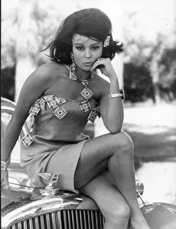 Mirella: Portrait of Mirella Maravidi on a car