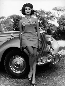Mirella: Portrait of Mirella Maravidi on a car