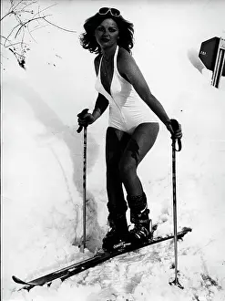 Manson: Portrait of model Jeane Manson skiing in a bathing suit