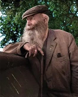 Comb: Portrait of an old man with beard and walking stick