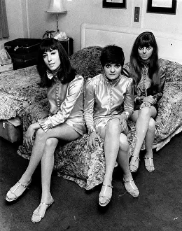 Reparata: Portrait of Reparata and the Delrons sitting on a bed