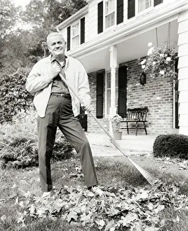 Retiree: Portrait Senior Man Outdoors in Front of House