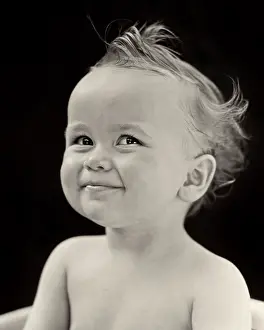 Portrait Smiling Baby Boy looking at Camera