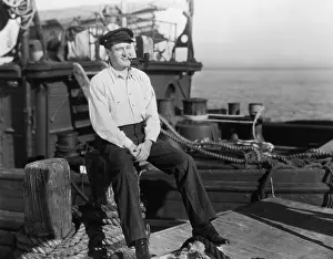 Seafaring: Portrait of smiling on dock near boat