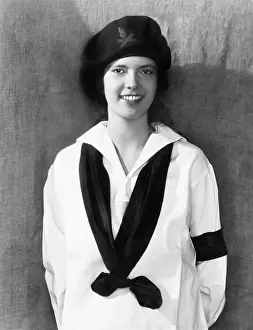 Knotting: Portrait of a smiling young woman