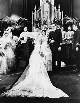 Newlywed: Portrait of wedding party at altar