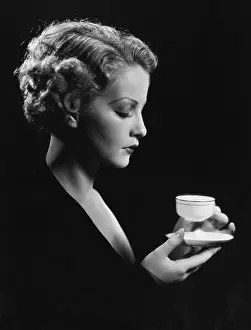 Refresh: Portrait of woman with beverage