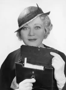 Addicts: Portrait of woman with cigarette case