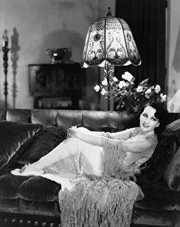 Couches: Portrait of woman on couch