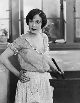 Tubs: Portrait of woman doing washing