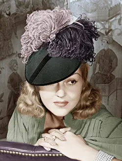 Close Ups: Portrait of a woman with a feathered hat
