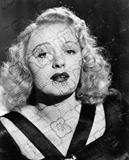 Flirtatious: Portrait of woman through lace