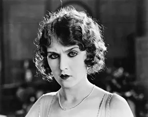 Lamenting: Portrait of a woman looking serious