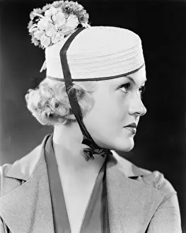 Close Ups: Portrait of a woman with a pillbox hat