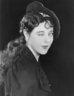 Wink: Portrait of woman winking
