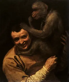 1580s: Portrait of a Young Man with a Monkey, by Carracci