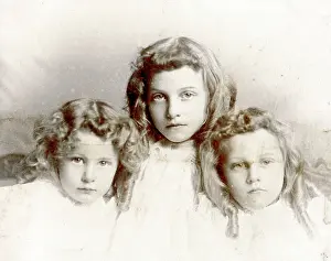 Siblings: Portrait of three young sisters