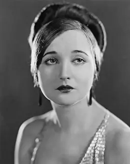 Glamourous: Portrait of serious young woman