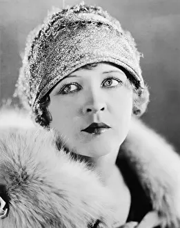 Brood: Portrait of serious young woman