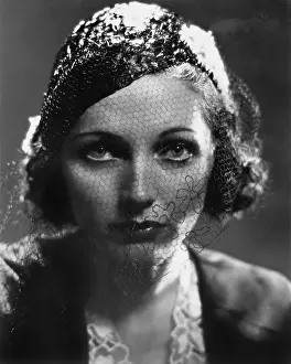 Lamenting: Portrait of a young woman looking serious