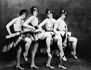 Cooperate: Portrait of four young women performing a dance