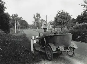Mailman: Post man delivering mail in rural, York County