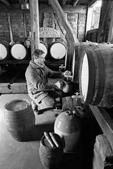 Cider: Pouring cider in cider barn at Dunkertons cider, England