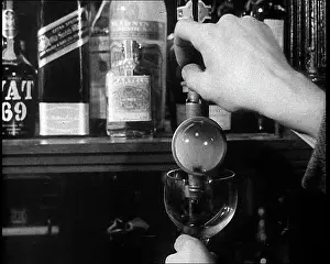 Someone: Someone Pouring Themselves a Glass of Spirit