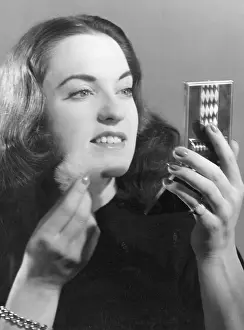 Powdering: POWDERING HER CHIN