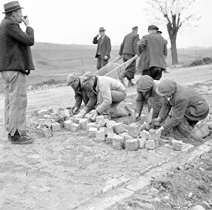 Cobble: Prague 1938, road being relined with cobble stone