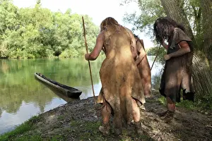 Temps: Prehistoric men with a canoe